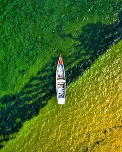 High angle view of boat floating on sea