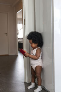 Toddler girl using cell phone