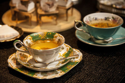 Close-up of tea cup on table