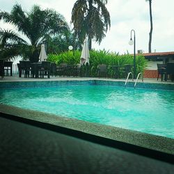 Swimming pool against blue sky