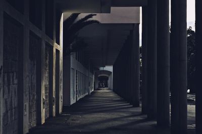 Empty corridor along buildings