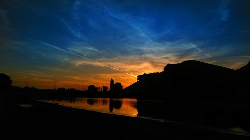 Scenic view of sea at sunset