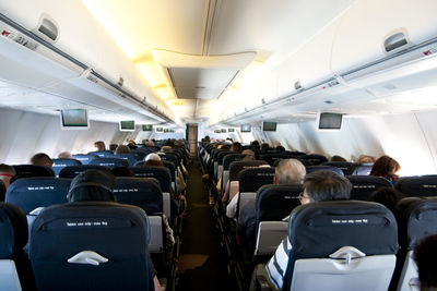 People sitting in airplane