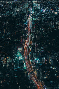 High angle view of illuminated cityscape at night