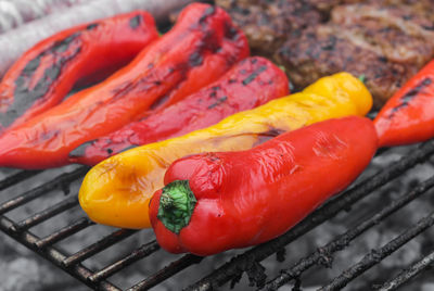 Seasonal red peppers on the grill.