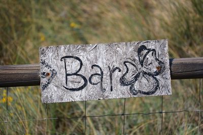 Close-up of text on wood