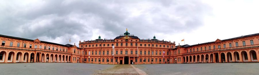 Facade of historic building against sky