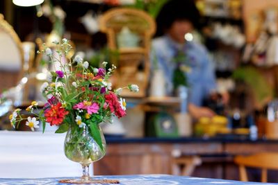 Close-up of flower vase on table