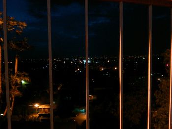 Illuminated street light at night