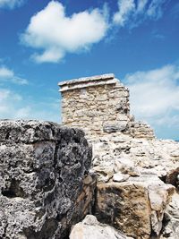 Low angle view of built structure against blue sky