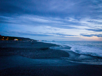 Scenic view of beach against clear sky
