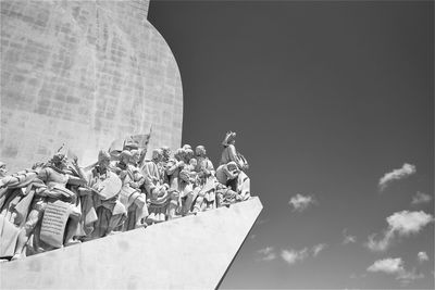 Low angle view of statue against sky