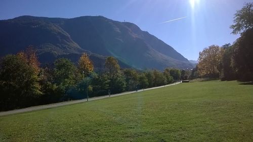 Panoramic view of trees and mountains against sky