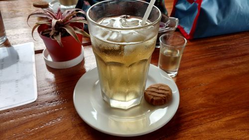 Close-up of beer glass on table