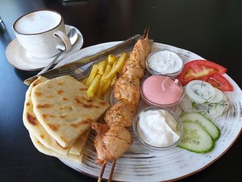 High angle view of breakfast served on table