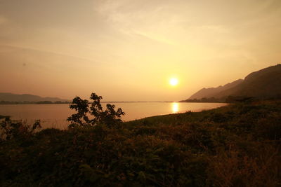 Scenic view of sea against sky during sunset