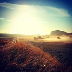 Sun shining over landscape