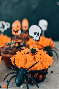 Close-up of halloween cupcakes on table