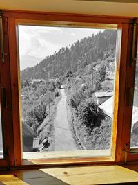 Scenic view of mountains seen through window