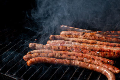 Close-up of meat on barbecue grill