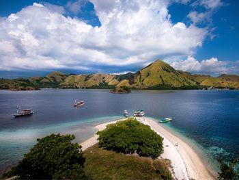 Scenic view of bay against sky