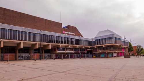 View of building against cloudy sky