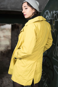 Young woman standing outdoors