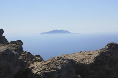 Scenic shot of rock formation in sea