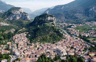 High angle view of townscape and mountains