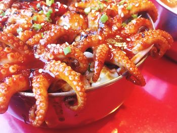 Close-up of octopus served in container