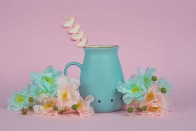 Close-up of pink flowers on table