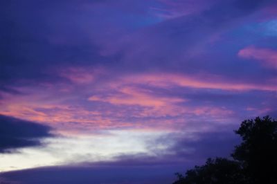 Low angle view of dramatic sky during sunset