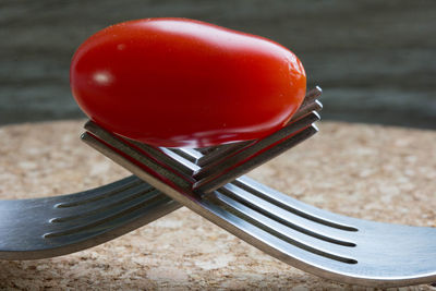 High angle view of tomatoes in container on table