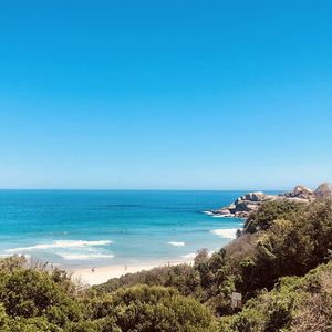 Scenic view of sea against clear blue sky