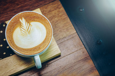 High angle view of coffee on table