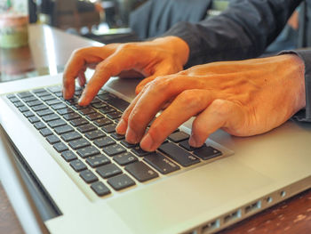 Close-up of person using mobile phone