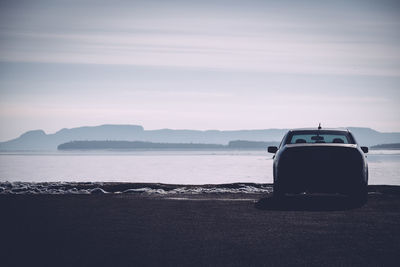 View of a car by the lake