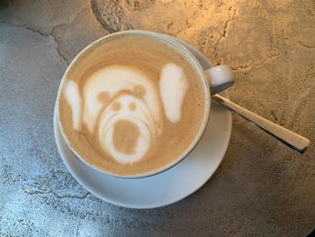 High angle view of coffee cup on table