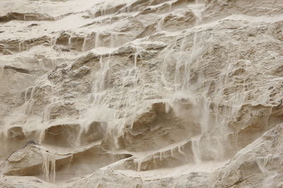 Close-up of snow on beach