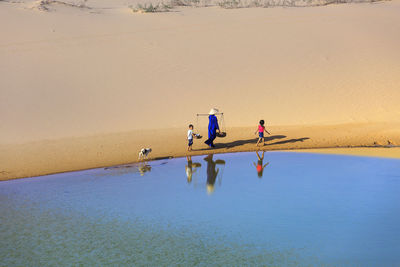 People working on beach