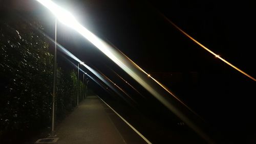 Illuminated road at night
