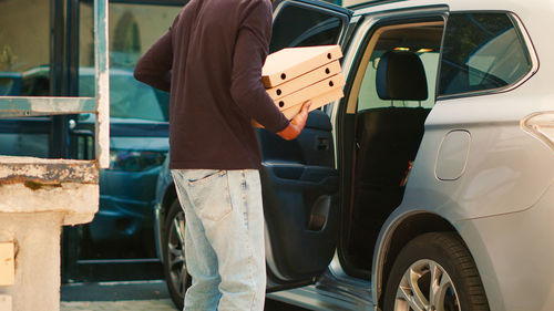 Rear view of man standing on street