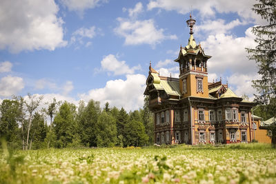 Russian terem in the clover field