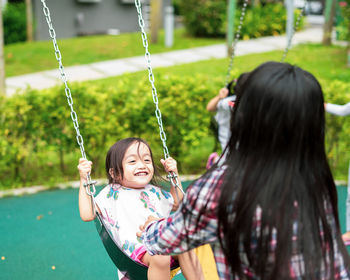 Active children playing at the playground. happy and fun time.