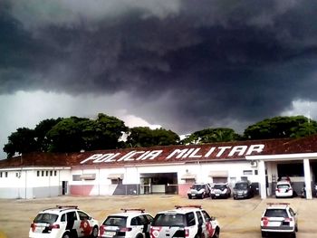 Cars on road against sky