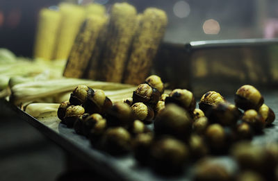 Close-up of chestnuts and corn 