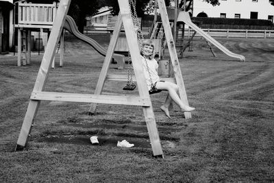 View of girl on swing