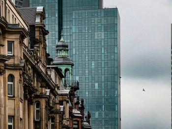 Low angle view of modern building against sky