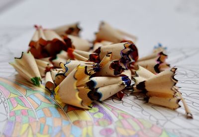 Close-up of multi colored pencils on table