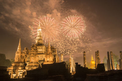 Firework display at night